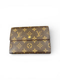 Louie Vuitton Monogram trifold wallet. Shows wear.