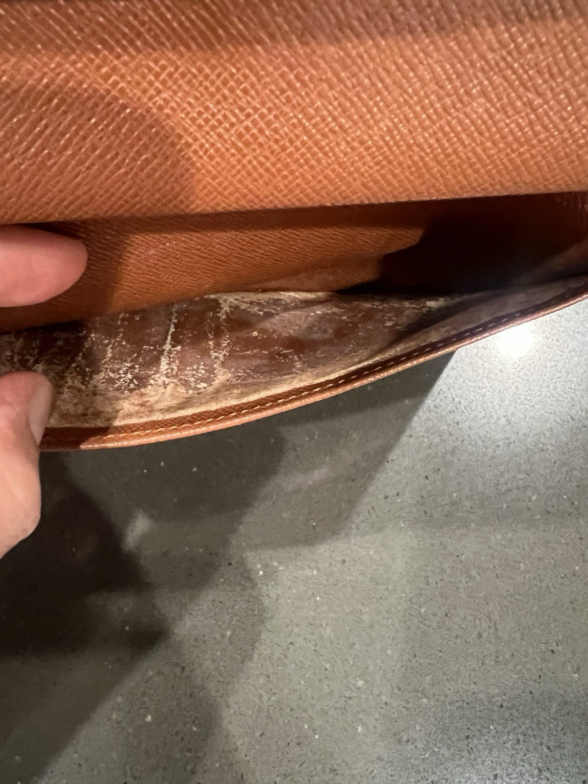 Louie Vuitton Monogram trifold wallet. Shows wear.