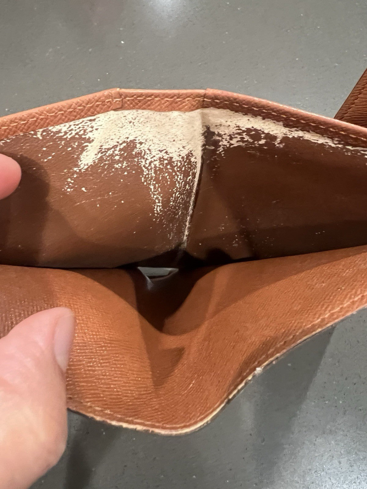 Louie Vuitton Monogram trifold wallet. Shows wear.